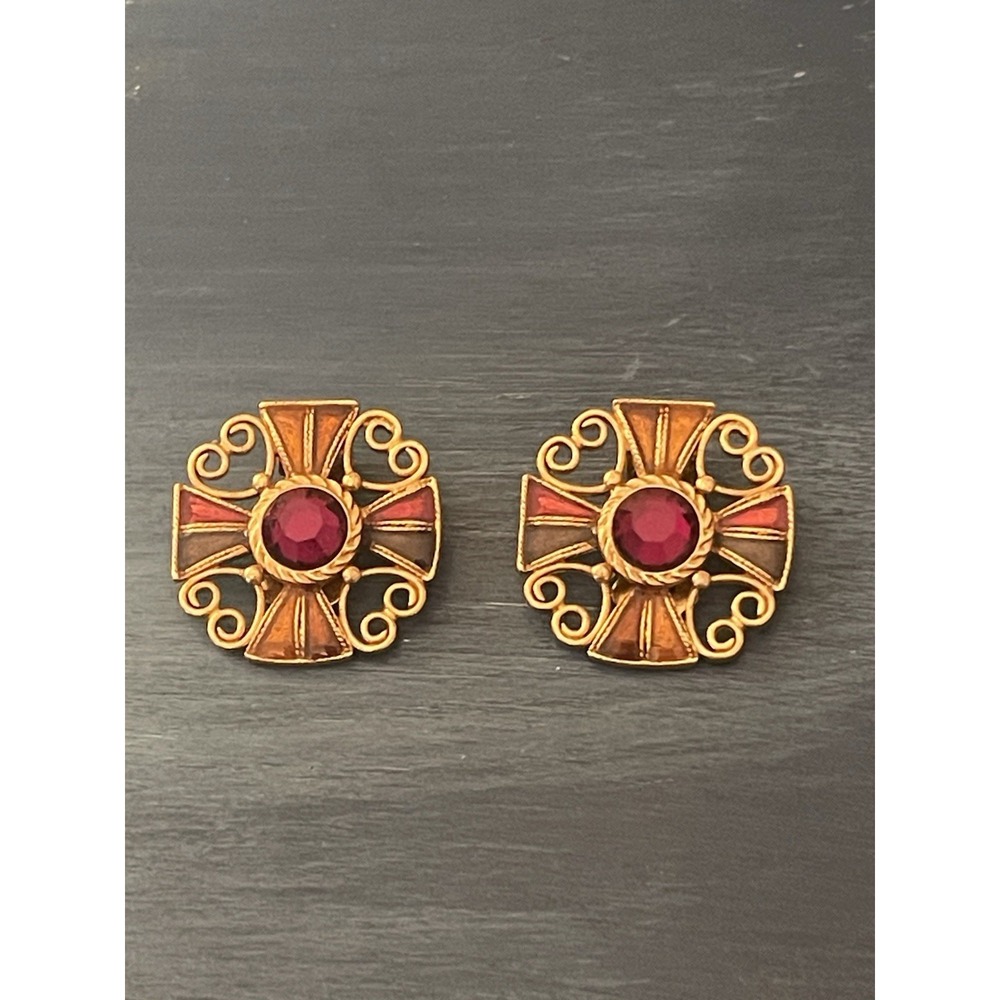 Vintage gold-tone clip-on earrings featuring a central Red Stone